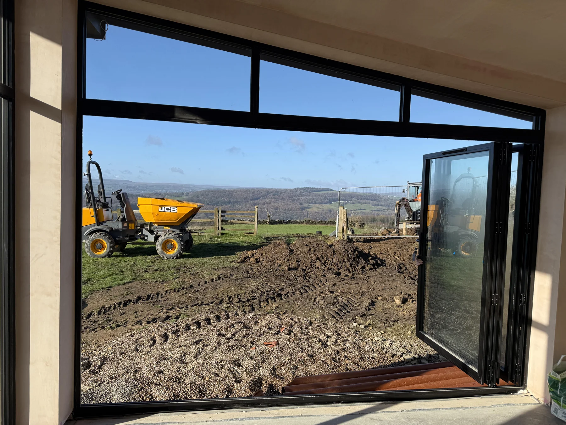 The lodge’s large windows opening towards the Yorkshire landscape during construction